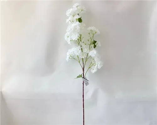 Comment les fleurs de soie en fleur de cerisier reproduisent-elles la texture délicate des vrais pétales de Sakura?
