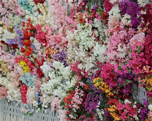 Explorez la salle d'exposition de fleurs artificielles ouli® - échantillons de gros et options personnalisées